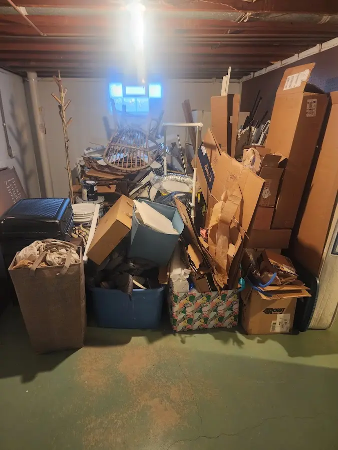 Roll-off dumpster container at job site for 2 Yard Dumpster Rental in Warrensville Heights